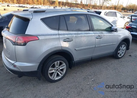 2016 Toyota Rav4 Hybrid Limited из США, поврежденный, VIN JTMDJREV9GD009323